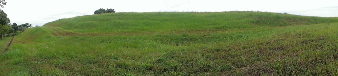Looking up on to the hilltop from the west where the road is